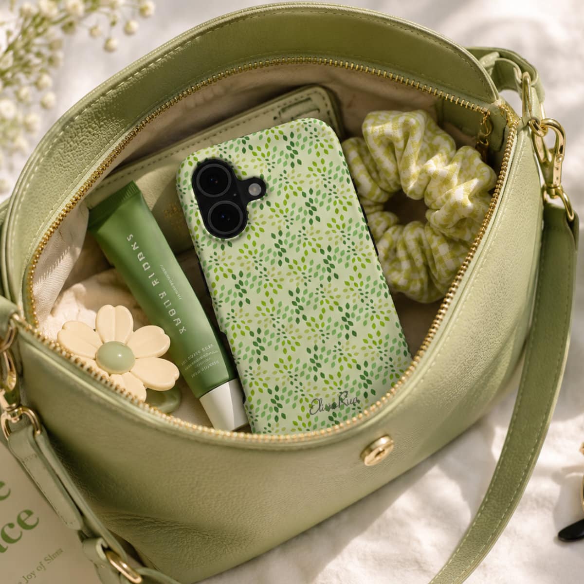Abstract green phone case in handbag