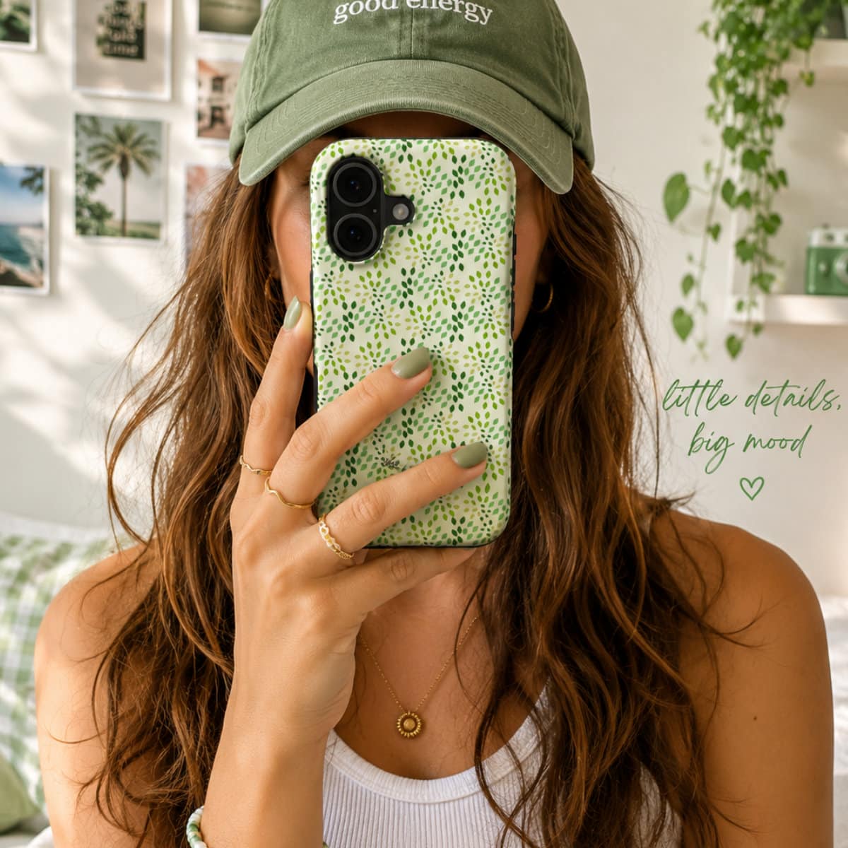 Abstract teardrop foliage phone case being held up