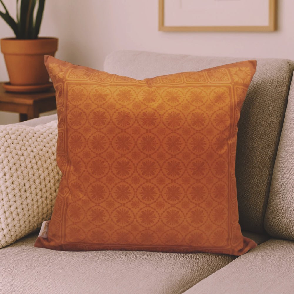 Copper geometric velvet cushion cover styled on sofa, luxury decorative cushion