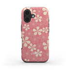 Front view of the Pink Rose tough phone case featuring a pattern of abstract cream flowers on a muted pink background.