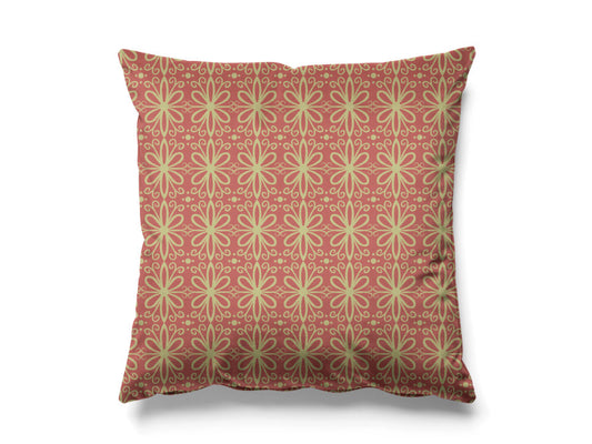 Decorative pillow with a geometric pattern in pink