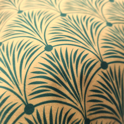 Close-up of Art Deco geometric pattern on luxury green velvet cushion cover