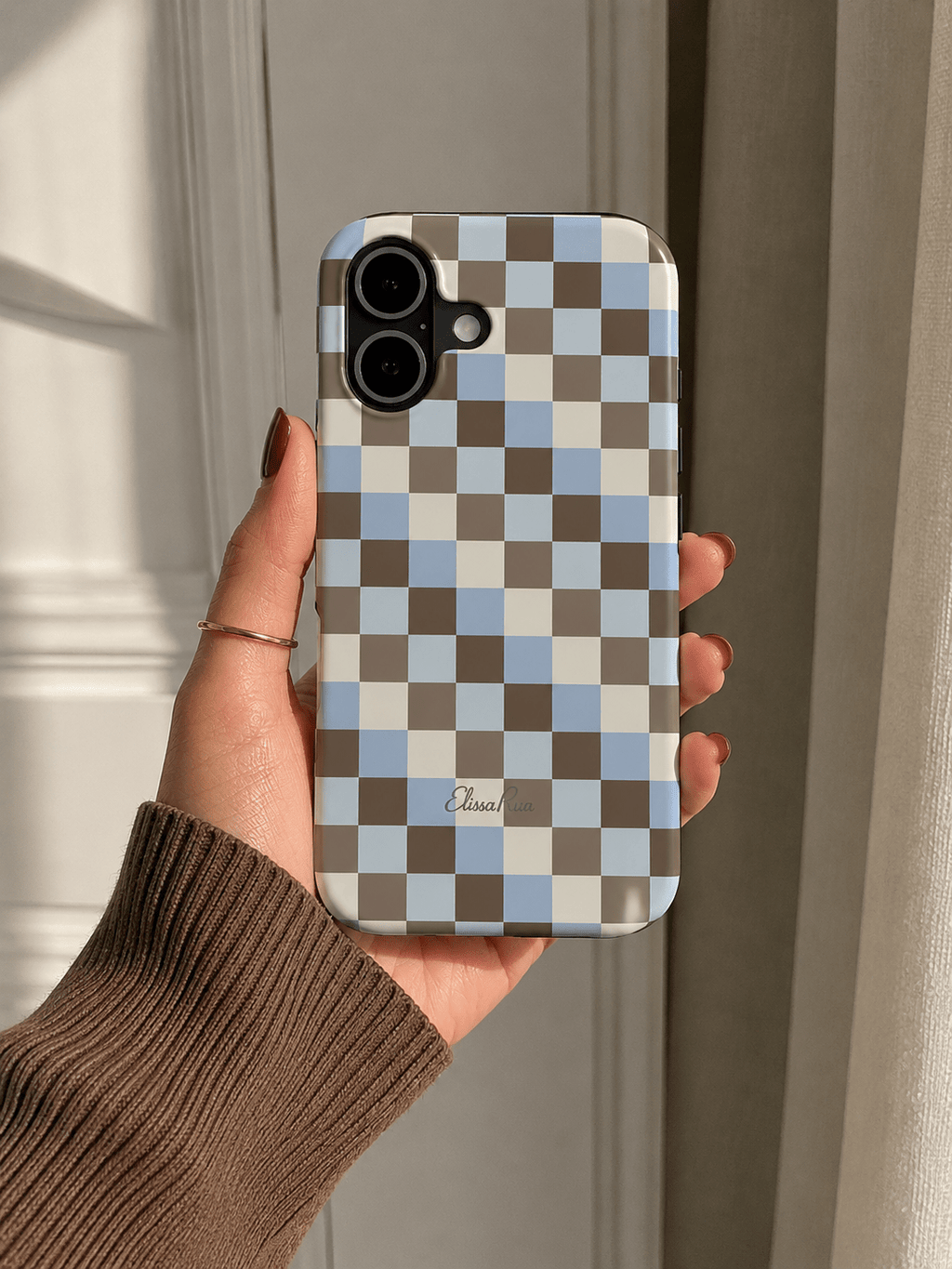 Tough phone case in blue and brown check pattern
