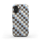 A phone case featuring a brown, beige, and light blue check pattern