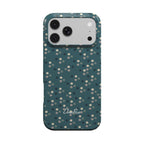 Bottle green tough phone case with scattered cream, grey, sage and dark blue dots, back view