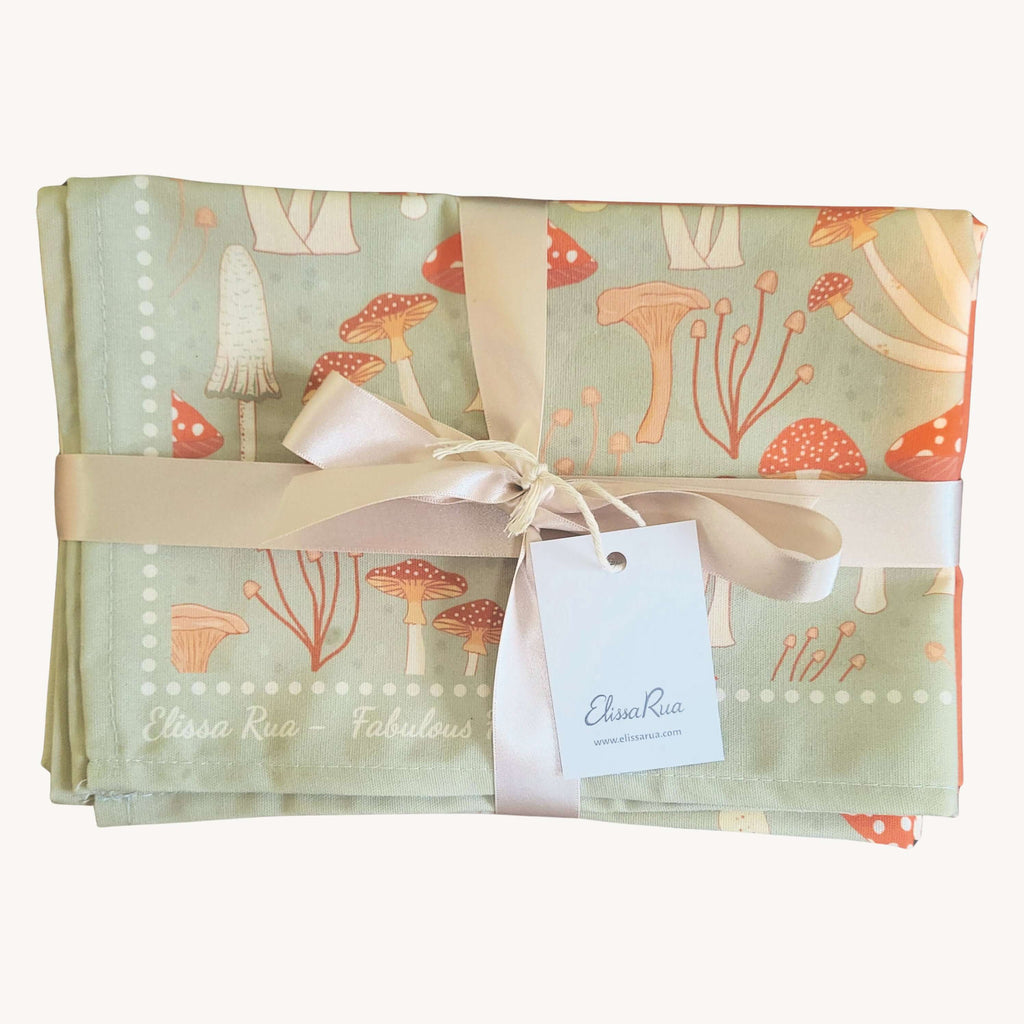 Folded Fabulous Funghi tea towel set of 3 with packaging, botanical mushroom kitchen towel gift set.