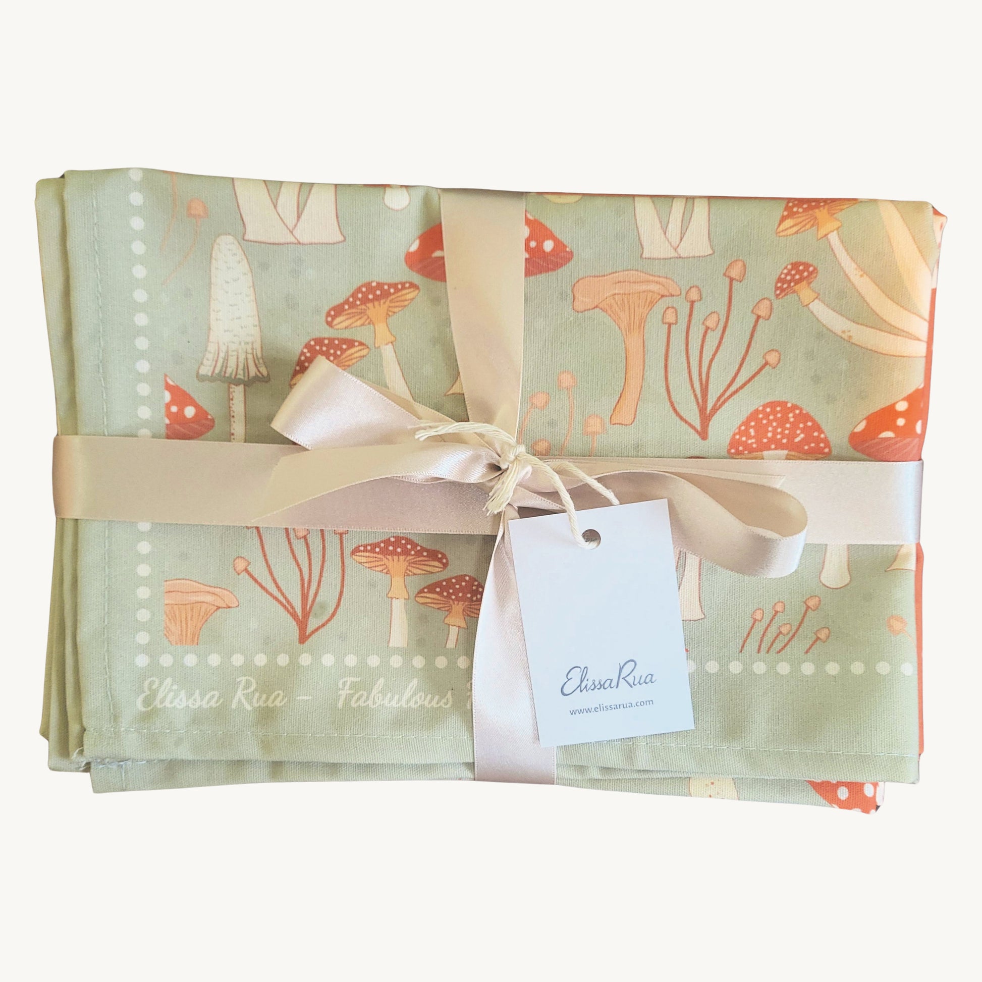 Folded Fabulous Funghi tea towel set of 3 with packaging, botanical mushroom kitchen towel gift set.