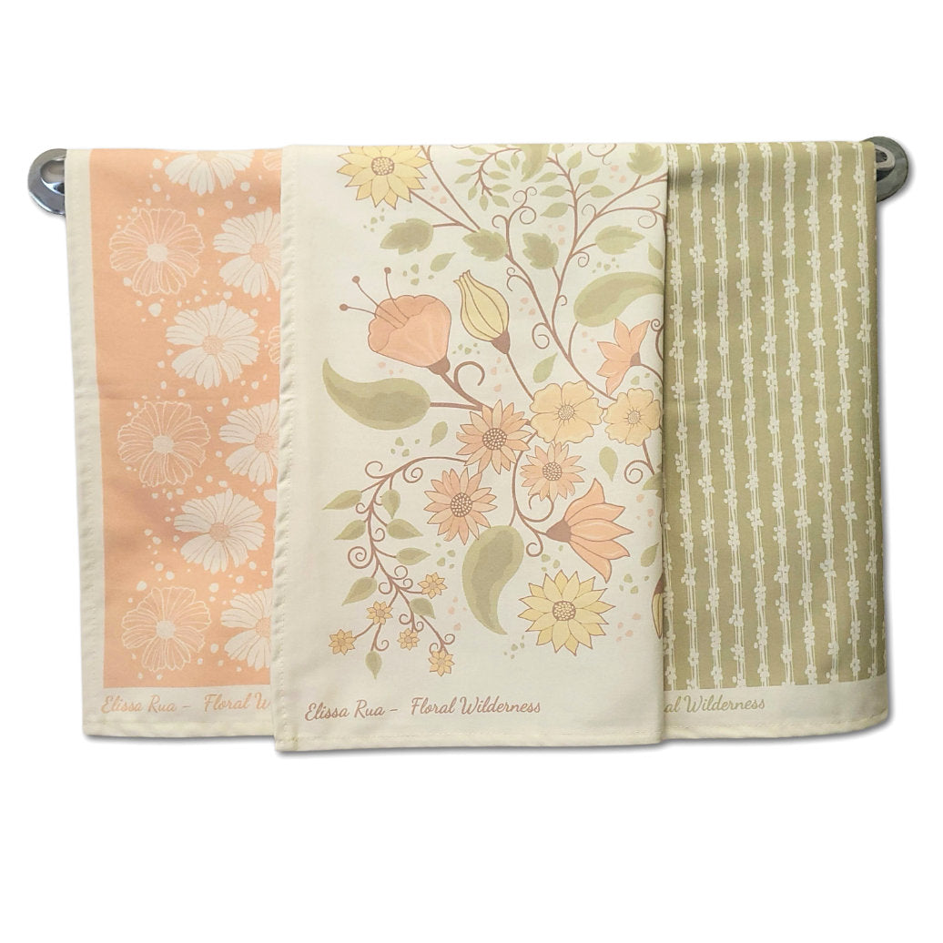 Designer tea towel set featuring three coordinated floral botanical prints from the Floral Wilderness collection, luxury kitchen towels set of 3.