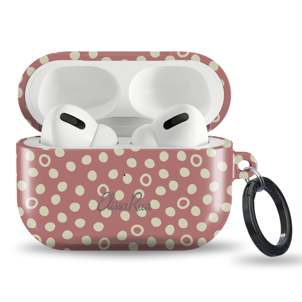 Retro inspired dusty rose AirPods case with classic dot pattern