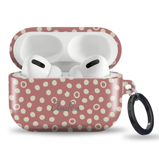 Retro inspired dusty rose AirPods case with classic dot pattern