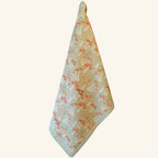 Cream and green patterned tea towel hanging display, botanical kitchen linen from the Fabulous Funghi set.