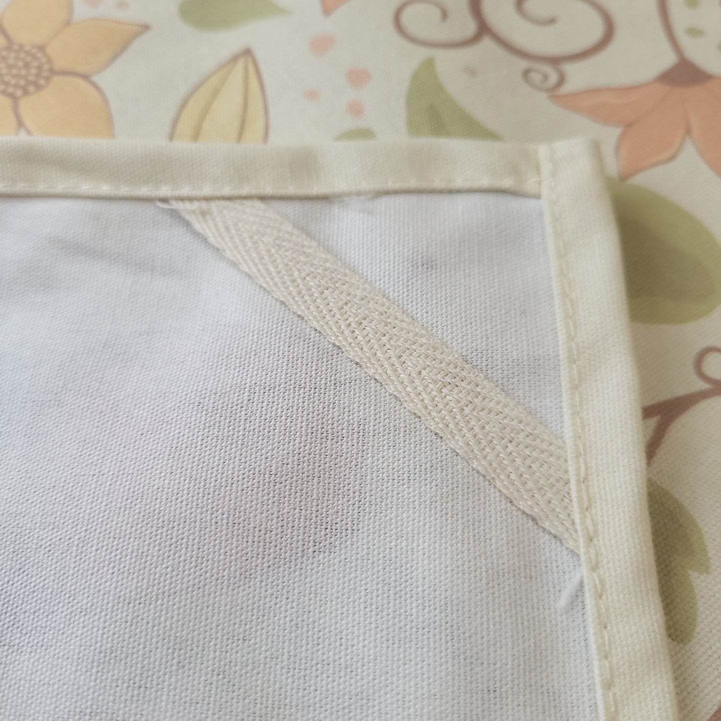 Designer tea towel from the Floral Wilderness collection shown hanging, featuring elegant botanical floral artwork.