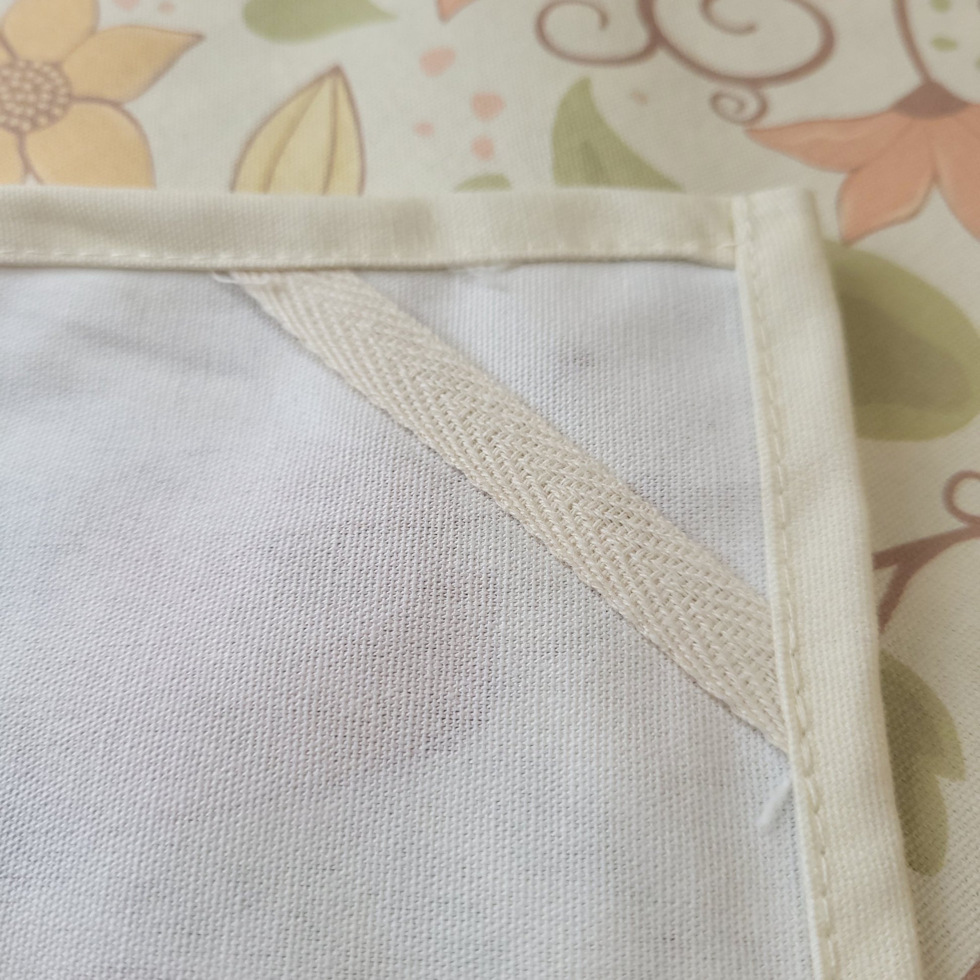 Designer tea towel from the Floral Wilderness collection shown hanging, featuring elegant botanical floral artwork.