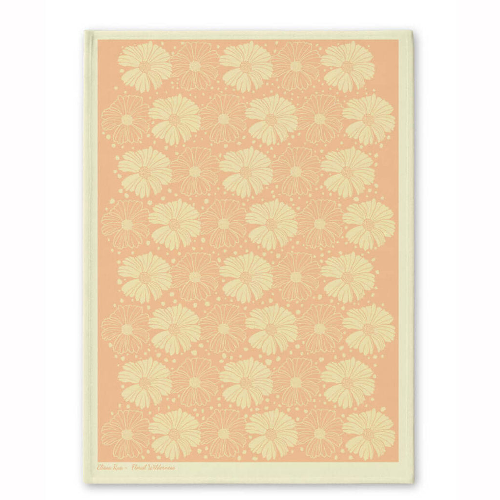 Peach floral patterned tea towel with soft botanical artwork, part of the Floral Wilderness designer collection.