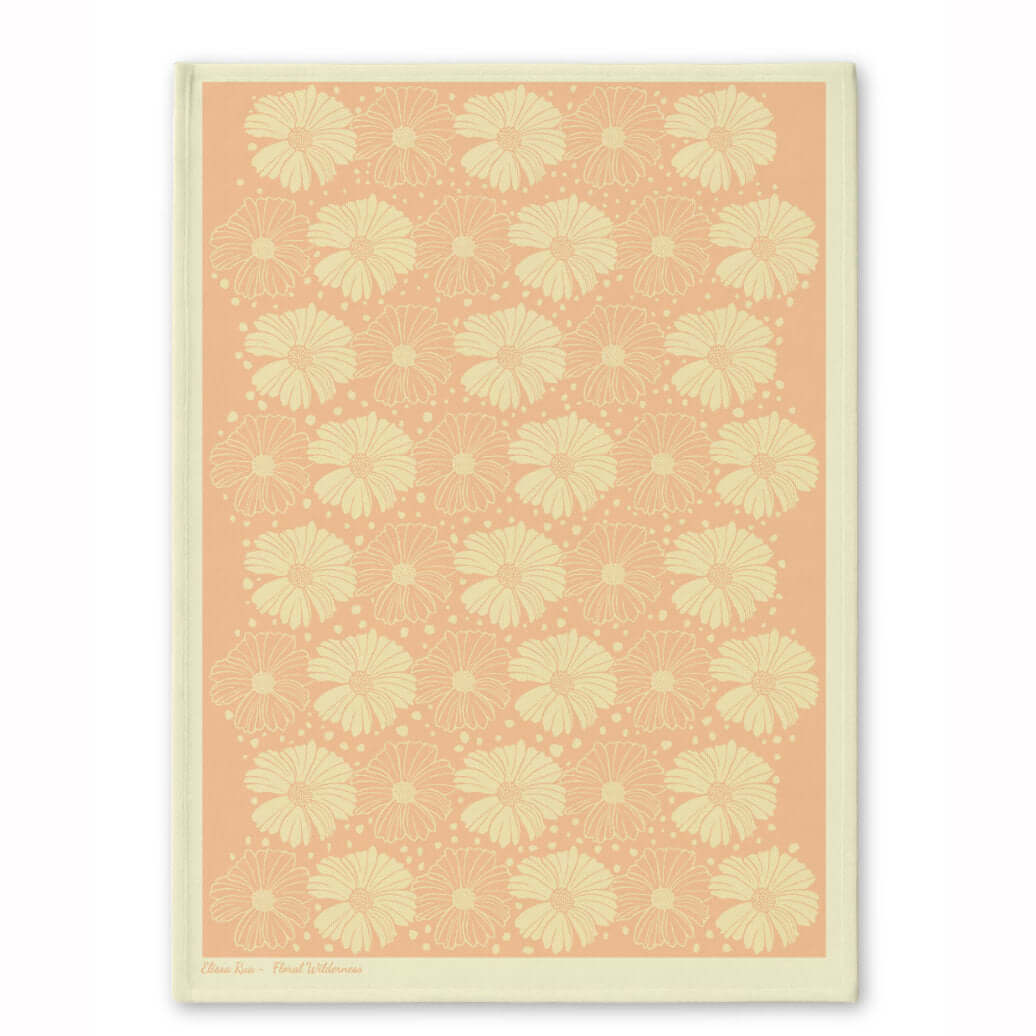 Peach floral patterned tea towel with soft botanical artwork, part of the Floral Wilderness designer collection.