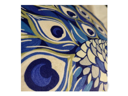 Detailed peacock illustration on designer velvet cushion cover